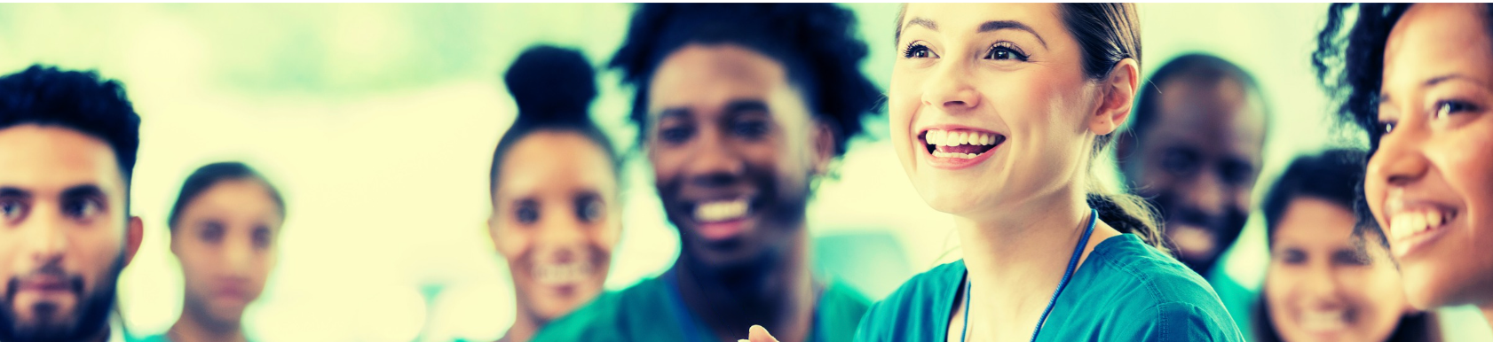 Nurses in a group smiling